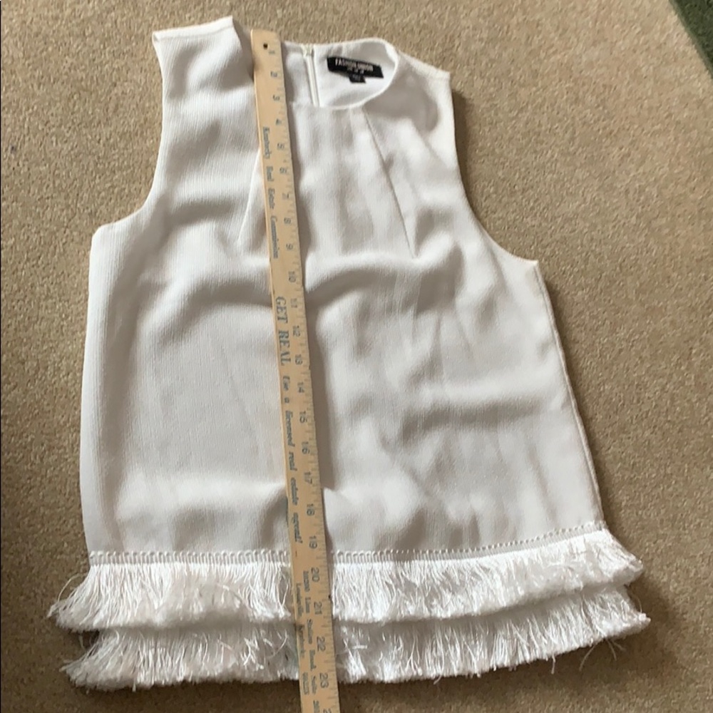 Fully lined sleeveless blouse with fringe